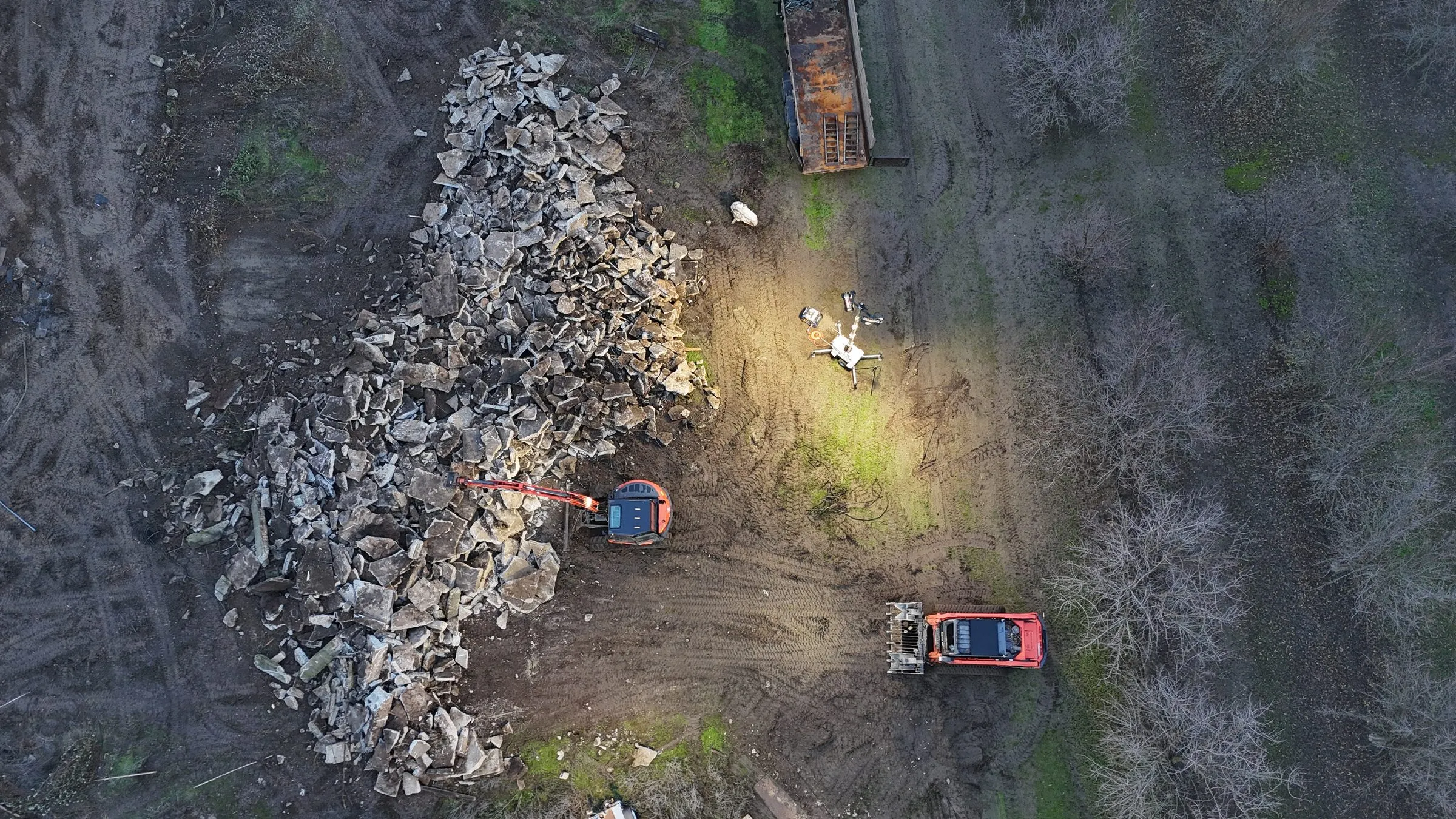 Aerial view of broken concrete from a Demo Patrol job, ready for recycling