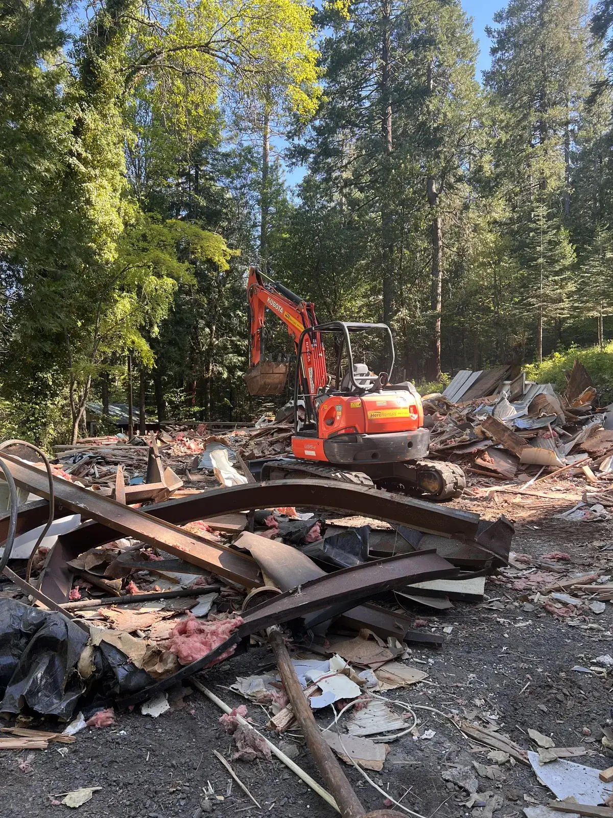 Home demolition in Magalia, California after Camp Fire